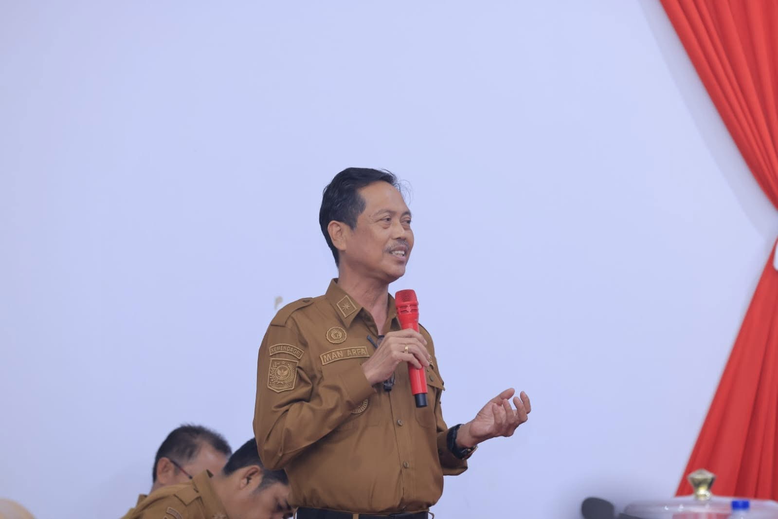 Drs Man Arfa di salah satu kegiatan Pemda Bombana