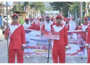 Langkah Tegap Disdukcapil Bombana di Defile Porseni Semarakkan Semangat Kemerdekaan